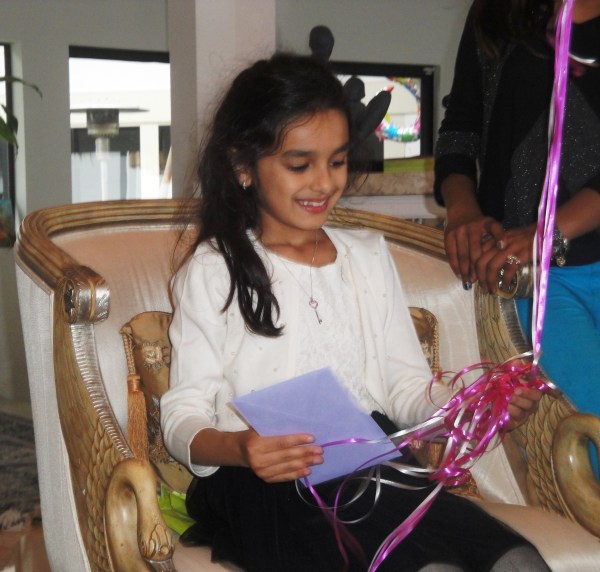 Maya opening her presents...