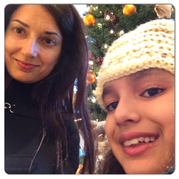 At our usual Maison Kayser...pretty Christmas tree. And Maya's pretty new hat.